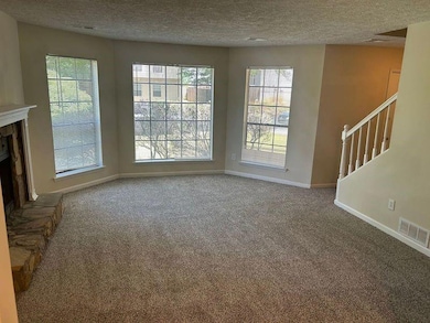 Look back at family room and front entry from dini