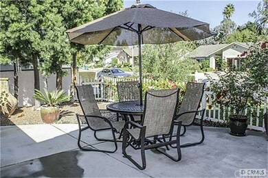 The spacious front porch is ideal for dining or ju