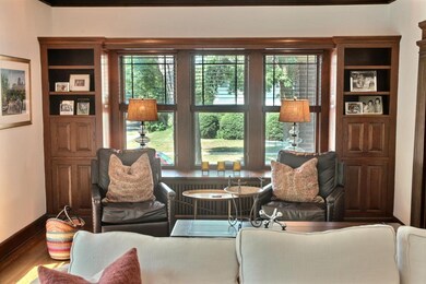 built-ins in the sun lit living room ...