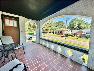 View of patio featuring covered porch
