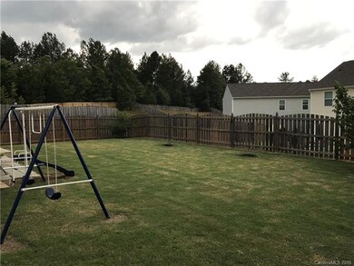 Manicured and fully fenced back yard