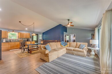 Open living area & kitchen/dining.