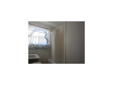 Bathroom. The bathroom is sparkling clean with sho
