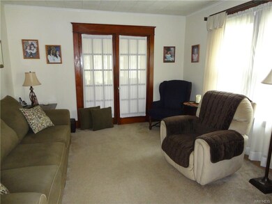 Light and bright describe the living room. There a