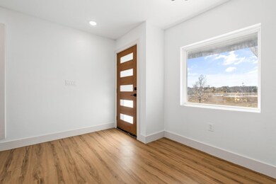 Foyer featuring light hardwood / wood-style floori