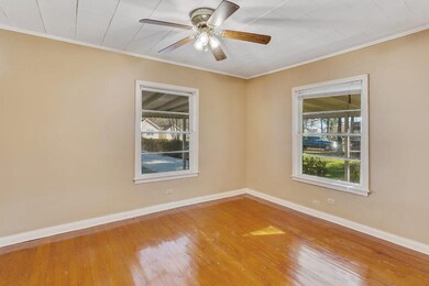 Bedroom:  Refinished wood floors; ceiling fan; nat