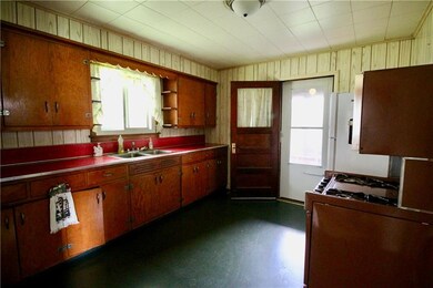 Kitchen including Refrigerator and Gas Stove