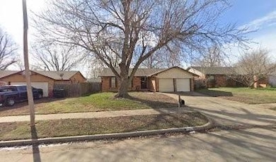 Ranch-style home with a garage