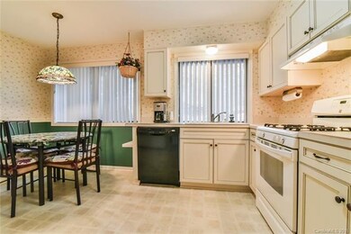 Remodeled kitchen opens to breakfast area, great w