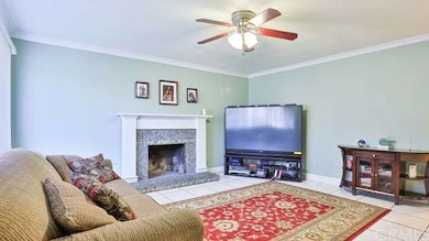 Family Room with Custom Baseboards and Crown Mould