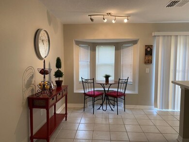 The bay window and seating could accommodate a lar