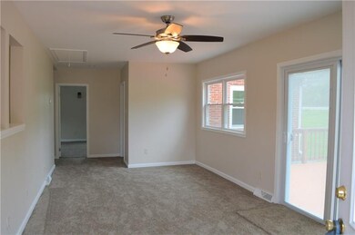 New carpet, windows , ceiling fan and sliding glas