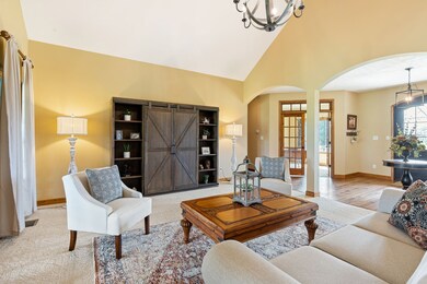 Arched openings in great room and dining room