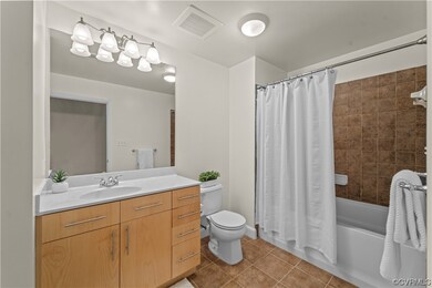 Full bathroom featuring shower / tub combo  tile f