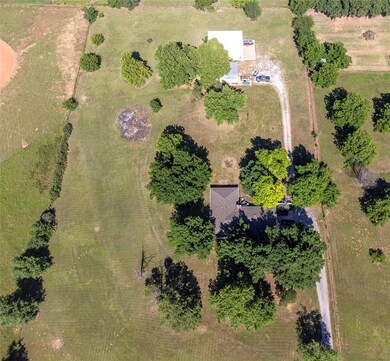 Overhead view of structures - home and 2 outbuildi