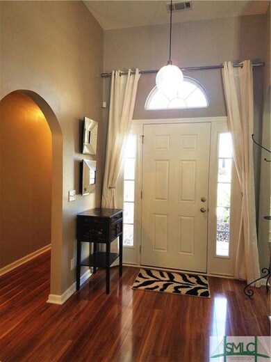 Gorgeous laminate flooring on the main level of th