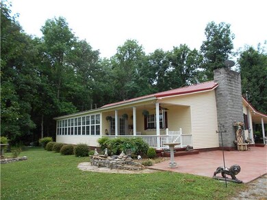 rock fireplace is gas logs, emergency heat, propane tank stays with the property, it is not rented they own it!