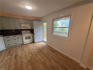 Kitchen with access to 1 of 2 decks