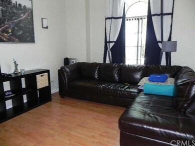 Spacious living room with high vaulted ceilings.