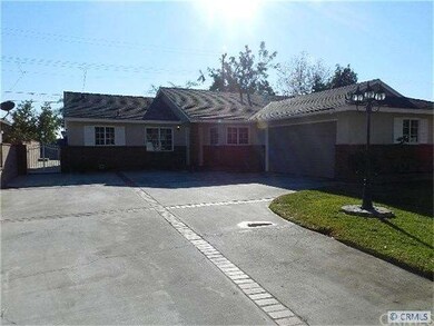 Large Driveway with Brick Detailing for Plenty of 