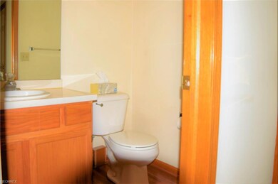 Downstairs 1/2 Bath off Hall from Garage