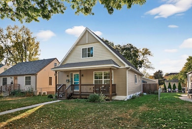 Modern curb appeal with a welcoming front entry, located near Shingle Creek and scenic walking trails.