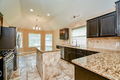 Beautiful kitchen with granite countertops and sta