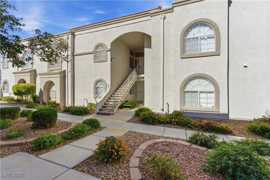 View of property featuring stairs