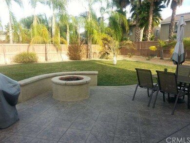 BUILT IN GAS FIR PIT WITH SEATING WALL