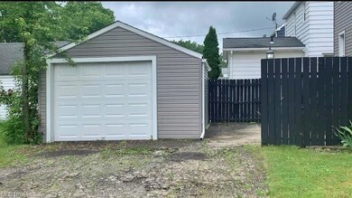 Garage from side street with parking