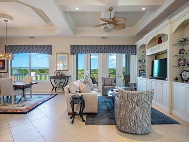 Open living room bringing the golf and lake views in!
