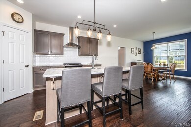 Gourmet Kitchen with Granite, Tile Backsplash, Gas