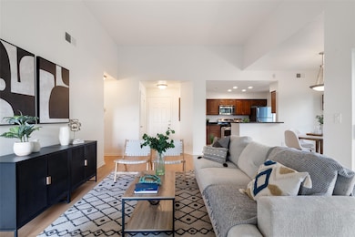 Living area featuring light wood-type flooring an