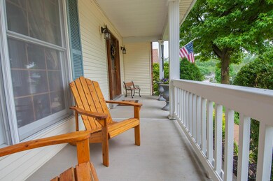 Enjoy the peaceful street from spacious covered porch