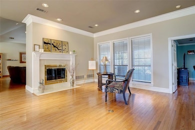Formal living room dual WBFP, beautiful wood floors