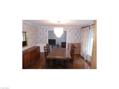 Formal Dining Room with Hardwood Floors