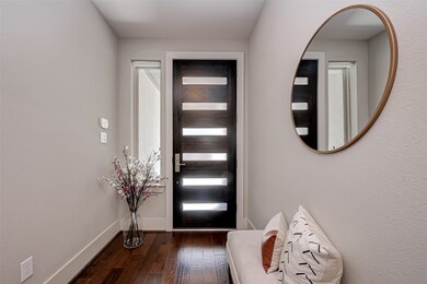 Entry with hardwood flooring