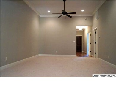 Large great room with volume ceilings and recessed