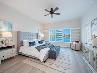 Bedroom featuring ceiling fan, light hardwood / wo