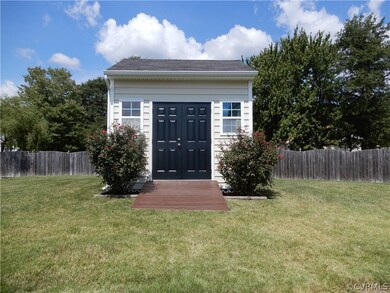 Tool Shed with ramp.  The shed has ample room for