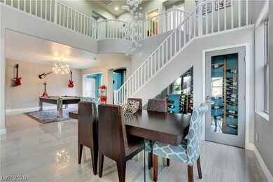 Functional and stylish wine fridge under staircase