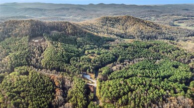 Birds eye view of property featuring a mountain vi