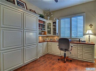 Secondary bedroom doubles as office and has a murp
