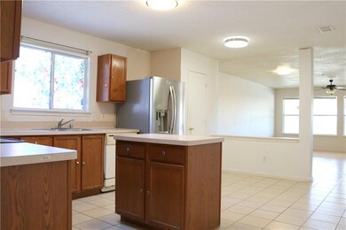 Island kitchen & breakfast area