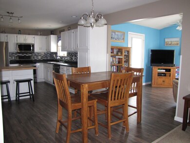 Dining area off kitchen, family room and living ro
