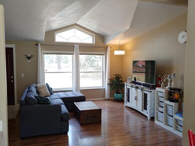 Living room with vaulted ceilings