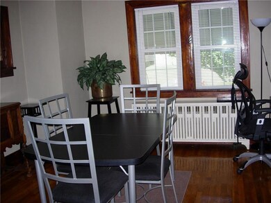 Spacious dining room with stained glass windows an