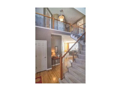 Grand stairway with rod iron spindals