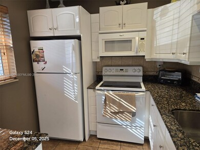 5181 W Oakland Park Blvd unit 102, Lauderdale Lakes, FL 33313 - photo 5