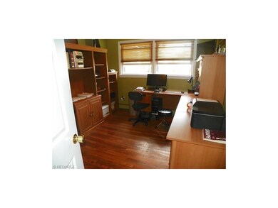 bedroom 1  presently used as office nice hardwood 